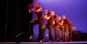 People lined up on stage