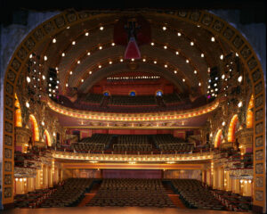 Grand view of the full house of Cutler Majestic theater from the stage facing the seats