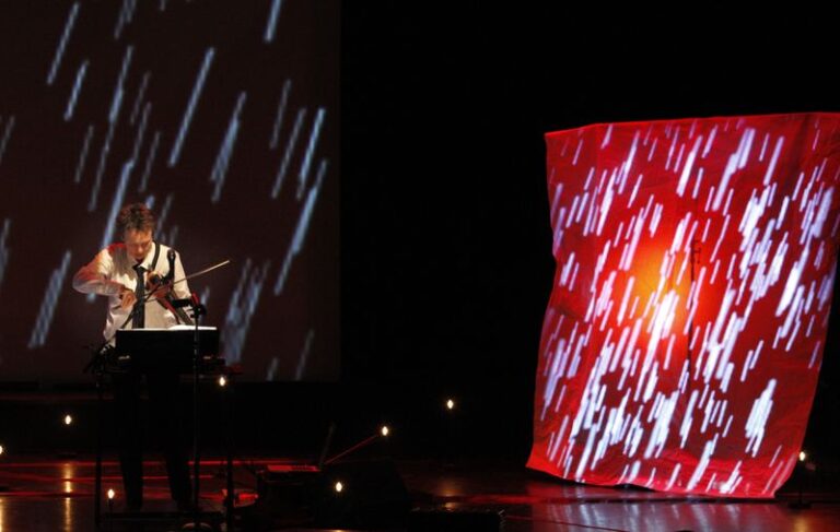 Laurie Anderson performing Delusion at Campbell Hall UCSB. Credit Lawrence K. Ho_Los Angeles Times.