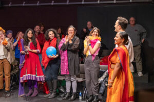 Audiences applauding the cast of Mrs. Krishnan's Party