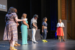 Members of Eve of Abolition's creative team on stage with Ronee Penoi and Elsa Mosquera 