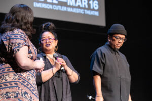 Members of Prison Dancer's creative team on stage