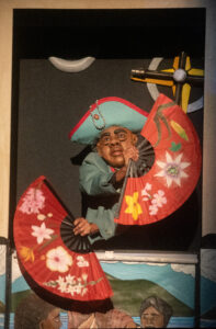 Puppet with colorful paper fans