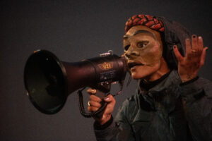 Puppet with a megaphone