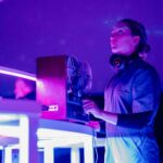 Planetarium interior with company member