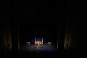 Wide photo of Murielle Borst-Tarrant standing on stage