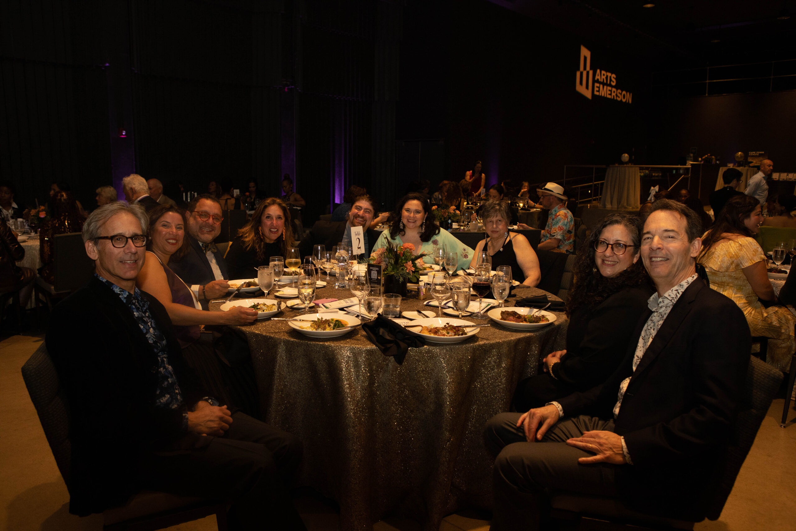 Attendees sitting at their banquet table