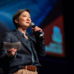 ArtsEmerson's Kathy Eow speaking to the crowd