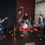 Musicians playing at World Alive! after party