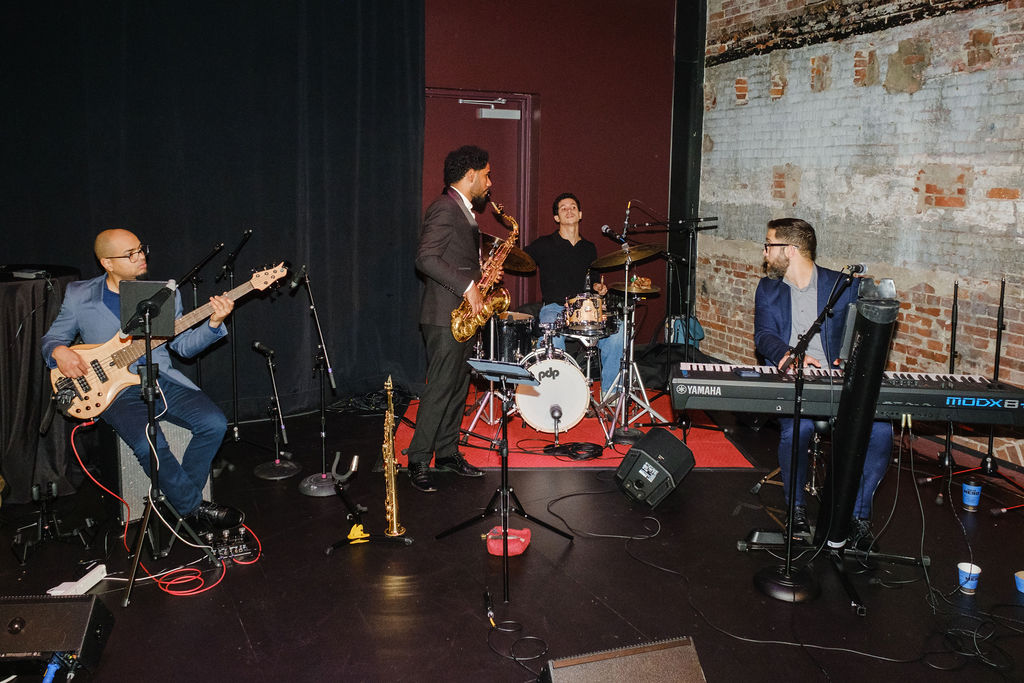 Musicians playing at World Alive! after party