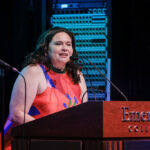 ArtsEmerson interim executive director Ronee Penoi at the podium