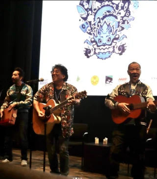 We were thrilled to have a member of @zumixradio attend the @bostonaafilm Centerpiece screening of Nobuko Miyamoto: A Song in Movement/Stop Asian Hate. BAAFF is playing through Oct. 27!⁠
⁠
Check out their audio piece on the event at the link in our bio! ⁠
⁠
📸 (Brian, Firehouse Friday Host)⁠
Three people playing guitars on stage⁠
⁠
#BAAFF #BosArts #FilmFestival⁠
⁠